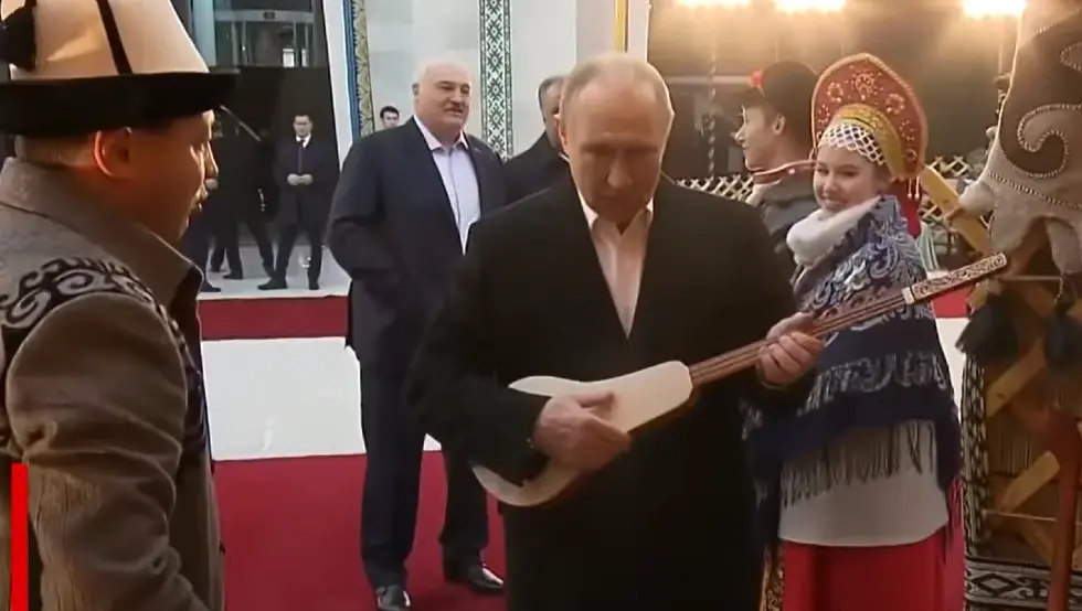 Путин